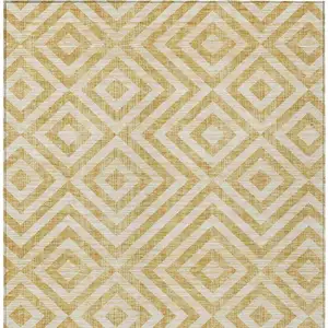 Photo of Gold Beige And Ivory Geometric Washable Indoor Outdoor Area Rug