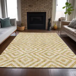 Photo of Gold Beige And Ivory Geometric Washable Indoor Outdoor Area Rug