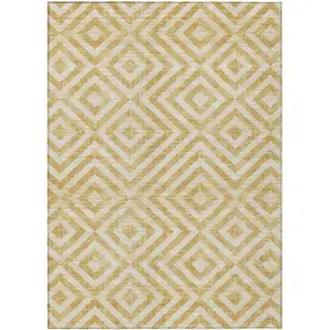 Photo of Gold Beige And Ivory Geometric Washable Indoor Outdoor Area Rug