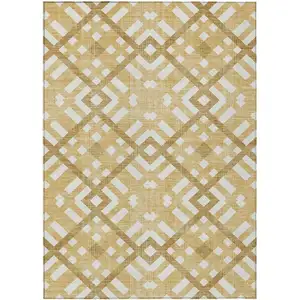 Photo of Gold Beige And Tan Geometric Washable Indoor Outdoor Area Rug