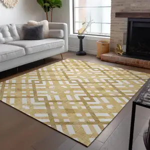 Photo of Gold Beige And Tan Geometric Washable Indoor Outdoor Area Rug