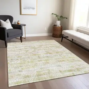 Photo of Gold Beige And Tan Striped Washable Indoor Outdoor Area Rug