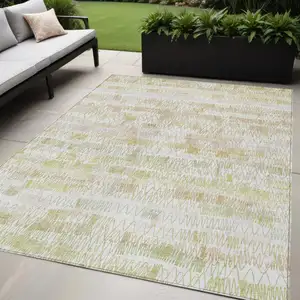 Photo of Gold Beige And Tan Striped Washable Indoor Outdoor Area Rug