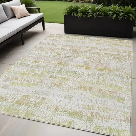 Gold Beige And Tan Striped Washable Indoor Outdoor Area Rug Photo 1