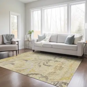 Photo of Gold Beige And Taupe Floral Washable Indoor Outdoor Area Rug