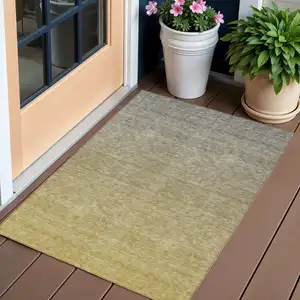 Photo of Gold Beige And Taupe Ombre Washable Indoor Outdoor Area Rug