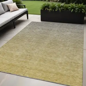 Photo of Gold Beige And Taupe Ombre Washable Indoor Outdoor Area Rug