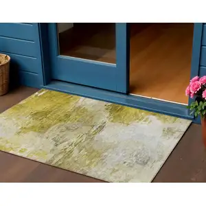 Photo of Gold Beige And Wheat Abstract Washable Indoor Outdoor Area Rug