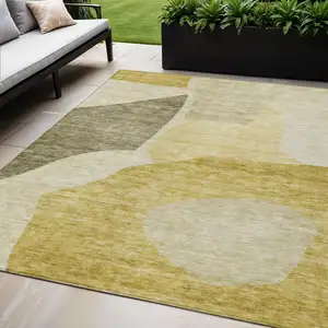 Photo of Gold Beige And Wheat Abstract Washable Indoor Outdoor Area Rug