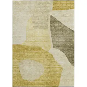 Photo of Gold Beige And Wheat Abstract Washable Indoor Outdoor Area Rug