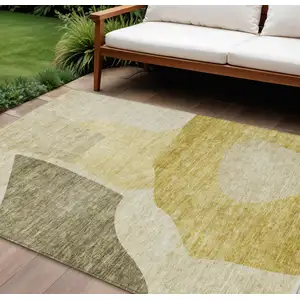 Photo of Gold Beige And Wheat Abstract Washable Indoor Outdoor Area Rug