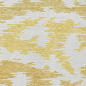 Photo of Gold Beige And Wheat Abstract Washable Indoor Outdoor Area Rug