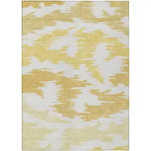 Photo of Gold Beige And Wheat Abstract Washable Indoor Outdoor Area Rug