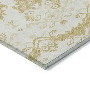 Photo of Gold Beige And Wheat Oriental Washable Indoor Outdoor Area Rug