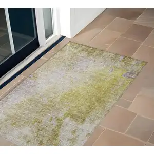 Photo of Gold Beige and Purple Abstract Washable Non Skid Indoor Outdoor Area Rug