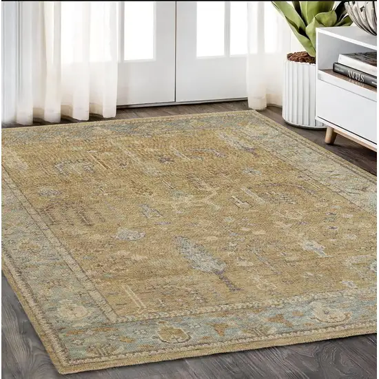 Gold Blue And Gray Wool Floral Hand Knotted Stain Resistant Area Rug With Fringe Photo 1