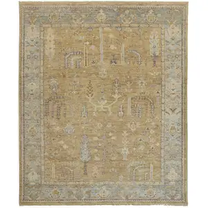 Photo of Gold Blue And Gray Wool Floral Hand Knotted Stain Resistant Area Rug With Fringe