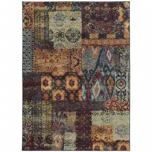 Photo of Gold Blue Purple Green And Red Abstract Power Loom Stain Resistant Area Rug