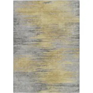 Photo of Gold Gray And Charcoal Abstract Washable Indoor Outdoor Area Rug