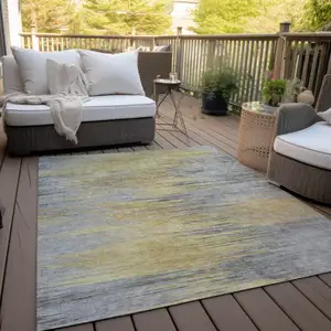 Photo of Gold Gray And Charcoal Abstract Washable Indoor Outdoor Area Rug