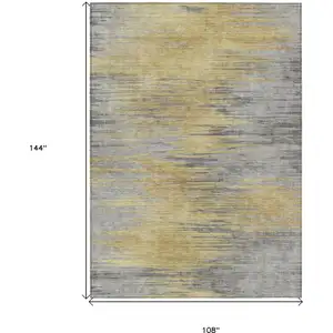 Photo of Gold Gray And Charcoal Abstract Washable Indoor Outdoor Area Rug