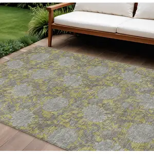 Photo of Gold Gray And Charcoal Floral Washable Indoor Outdoor Area Rug