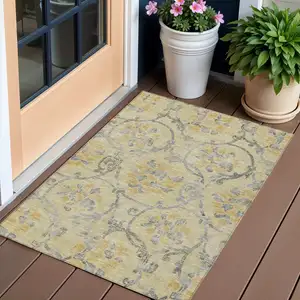 Photo of Gold Gray And Charcoal Floral Washable Indoor Outdoor Area Rug