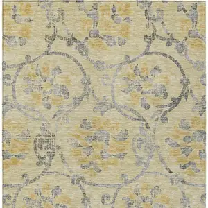 Photo of Gold Gray And Charcoal Floral Washable Indoor Outdoor Area Rug