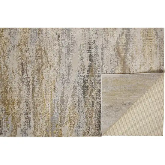 Gold Gray And Ivory Abstract Area Rug Photo 8