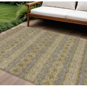 Photo of Gold Gray And Silver Floral Medallion Washable Indoor Outdoor Area Rug