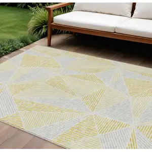 Photo of Gold Gray And Wheat Geometric Washable Indoor Outdoor Area Rug