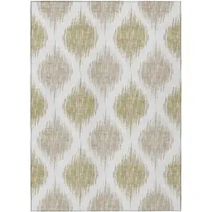 Photo of Gold Ivory And Beige Ikat Washable Indoor Outdoor Area Rug