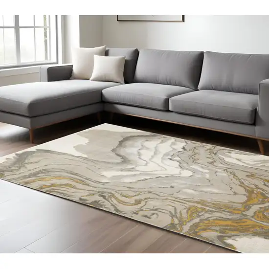 Gold Ivory and Gray Abstract Area Rug Photo 1