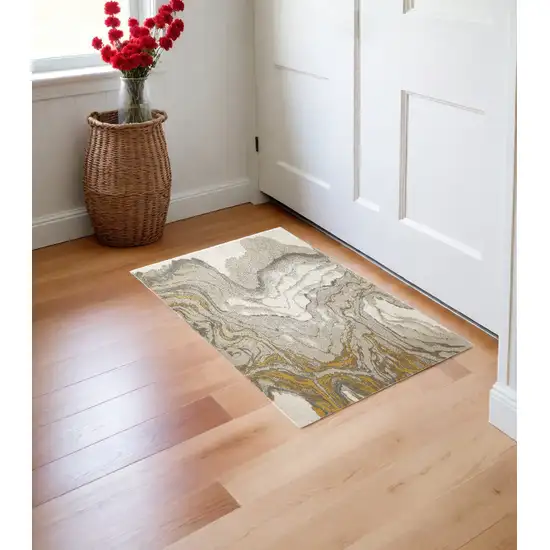 Gold Ivory And Gray Abstract Stain Resistant Area Rug Photo 1