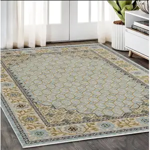 Photo of Gold Oriental Area Rug With Fringe