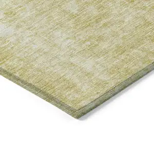 Photo of Gold Wheat And Ivory Abstract Washable Indoor Outdoor Area Rug