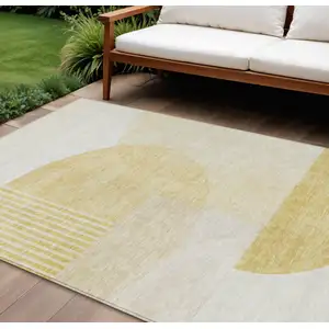 Photo of Gold Wheat And Ivory Geometric Washable Indoor Outdoor Area Rug