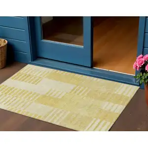 Photo of Gold Wheat And Ivory Striped Washable Indoor Outdoor Area Rug