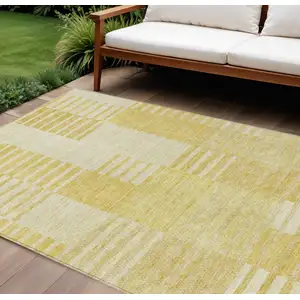 Photo of Gold Wheat And Ivory Striped Washable Indoor Outdoor Area Rug