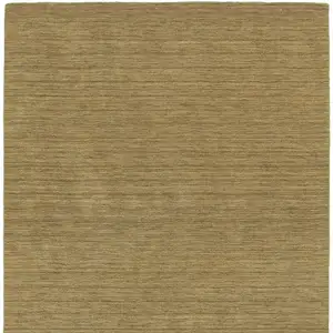 Photo of Gold Wool Hand Tufted Area Rug