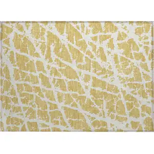 Photo of Gold and White Abstract Washable Non Skid Indoor Outdoor Area Rug