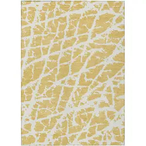 Photo of Gold and White Abstract Washable Non Skid Indoor Outdoor Area Rug