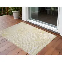 Photo of Gold and White Abstract Washable Non Skid Indoor Outdoor Area Rug