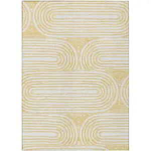 Photo of Gold and White Abstract Washable Non Skid Indoor Outdoor Area Rug