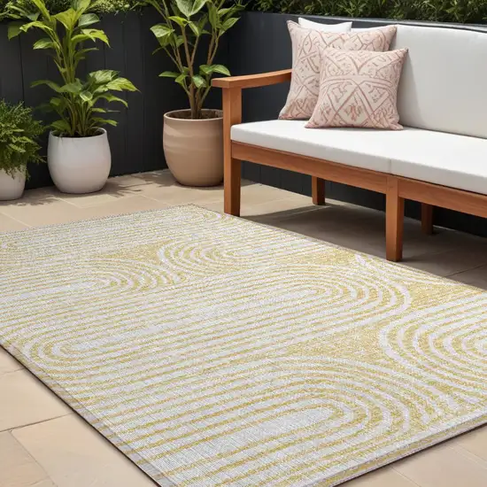 Gold and White Abstract Washable Non Skid Indoor Outdoor Area Rug Photo 1