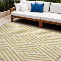 Photo of Gold and White Geometric Washable Non Skid Indoor Outdoor Area Rug