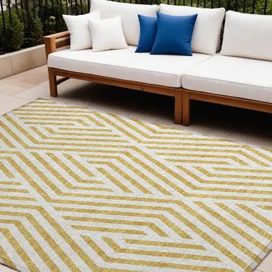 Gold and White Geometric Washable Non Skid Indoor Outdoor Area Rug Photo 1