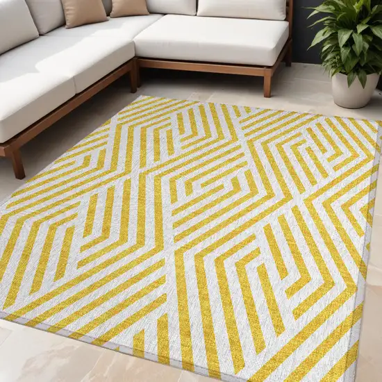 Gold and White Geometric Washable Non Skid Indoor Outdoor Area Rug Photo 1