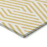 Photo of Gold and White Geometric Washable Non Skid Indoor Outdoor Area Rug