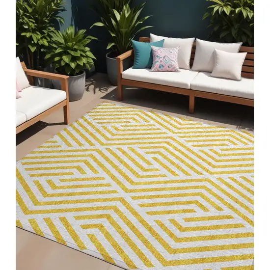 Gold and White Geometric Washable Non Skid Indoor Outdoor Area Rug Photo 1